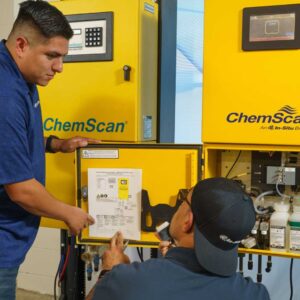 technicians working on a water system