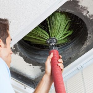 Man cleaning ventilation systems has a positive effect on air quality.